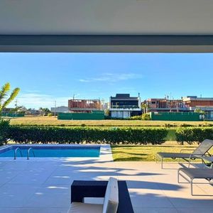 Casa com 265m², 3 dormitórios, 3 suítes, 2 vagas no Condomínio Ilhas Park em Torres para Comprar