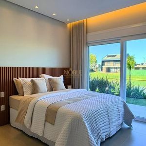 Casa de Condomínio com 264m², 4 dormitórios, 4 suítes, 2 vagas no Reserva das Águas em Torres para Comprar