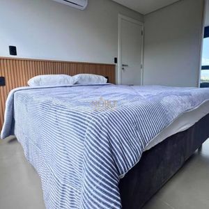 Apartamento com 64m², 2 dormitórios, 1 suíte, 1 vaga no Aston em Torres para Comprar