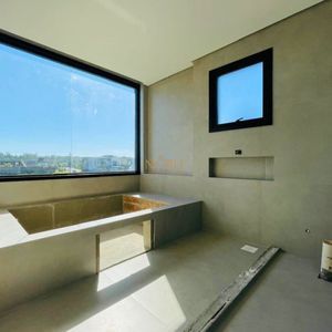 Casa de Condomínio com 390m², 4 dormitórios, 4 suítes, 2 vagas no Reserva das Águas em Torres para Comprar