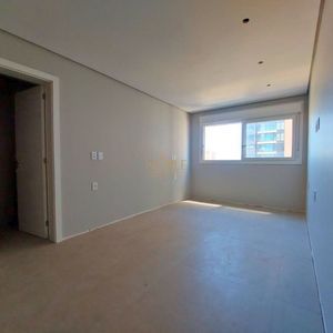 Apartamento com 114m², 3 dormitórios, 1 suíte, 2 vagas no Titanium em Torres para Comprar