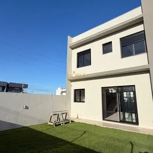 Geminado com 141m², 3 dormitórios, 1 suíte, 2 vagas no bairro Morada das Palmeiras em Torres para Comprar
