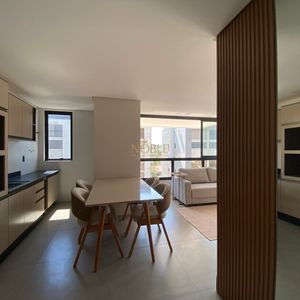 Apartamento com 60m², 2 dormitórios, 1 suíte, 1 vaga no Aston em Torres para Comprar
