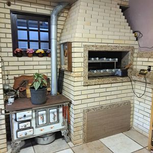 Sobrado com 330m², 3 dormitórios, 1 suíte, 5 vagas no bairro Centenário em Torres para Comprar