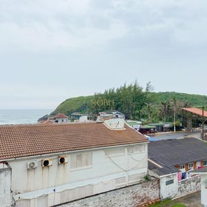 Apartamento com 74m², 2 dormitórios, 1 suíte, 1 vaga no Essenza em Torres para Comprar