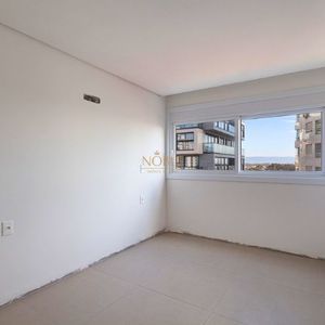 Apartamento com 100m², 2 dormitórios, 2 suítes, 2 vagas no Bella Vita em Torres para Comprar