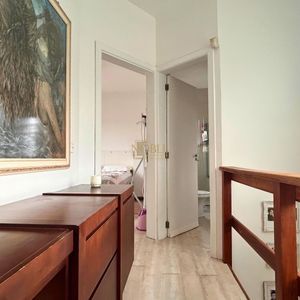 Casa com 170m², 2 dormitórios, 3 vagas no bairro Centenário em Torres para Comprar