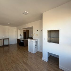 Apartamento com 80m², 2 dormitórios, 1 suíte, 1 vaga no Trade Center em Torres para Comprar
