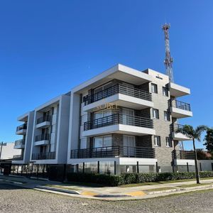Apartamento com 84m², 2 dormitórios, 1 suíte, 2 vagas no Ilha de Creta em Torres para Comprar