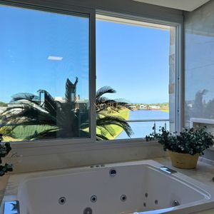 Casa de Condomínio com 444m², 4 dormitórios, 4 suítes, 4 vagas no Reserva das Águas em Torres para Comprar