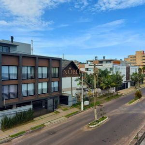 Apartamento com 99m², 2 dormitórios, 2 suítes, 2 vagas no Florença em Torres para Comprar