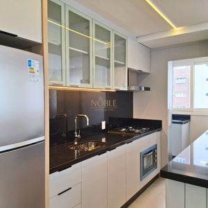 Apartamento com 77m², 2 dormitórios, 1 suíte, 2 vagas no Maui Residencial em Torres para Comprar
