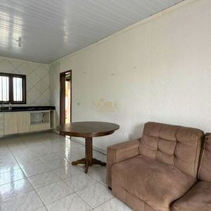 Casa com 74m², 2 dormitórios, 1 vaga no bairro Igra Sul em Torres para Comprar