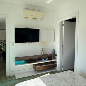 Casa com 400m², 5 dormitórios, 1 suíte, 4 vagas no bairro Stan em Torres para Comprar