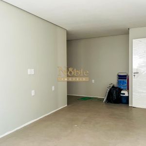 Apartamento com 119m², 3 dormitórios, 1 suíte, 2 vagas no Titanium em Torres para Comprar