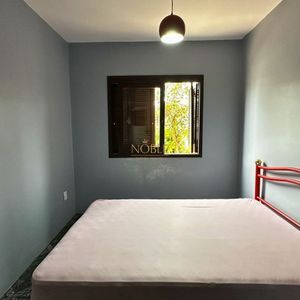 Apartamento com 94m², 3 dormitórios, 1 suíte, 2 vagas no Edifício Saron em Torres para Comprar