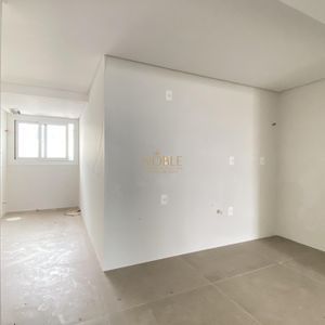 Apartamento com 101m², 3 dormitórios, 1 suíte, 2 vagas no Residencial Exclusive em Torres para Comprar