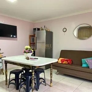 Casa com 148m², 3 dormitórios, 1 suíte, 2 vagas no bairro Morada das Palmeiras em Torres para Comprar