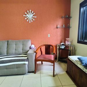 Casa, 6 dormitórios, 2 suítes, 3 vagas no bairro Getúlio Vargas em Torres para Comprar