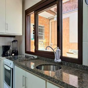 Casa com 98m², 3 dormitórios, 2 vagas no bairro Praia da Cal em Torres para Comprar