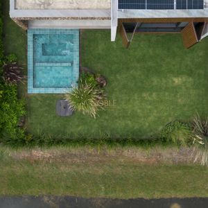 Casa de Condomínio com 244m², 4 dormitórios, 4 suítes, 2 vagas no Condomínio Ilhas Park em Torres para Comprar