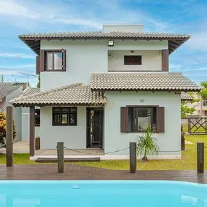 Casa, 4 dormitórios, 1 suíte, 2 vagas no bairro Itapeva Norte em Torres para Comprar