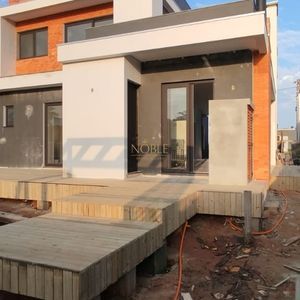 Casa de Condomínio com 204m², 3 dormitórios, 3 suítes, 2 vagas no Reserva das Águas em Torres para Comprar