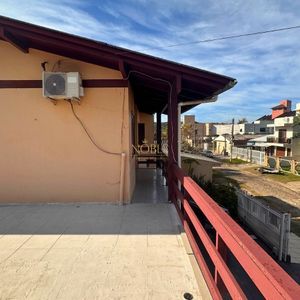 Casa, 6 dormitórios, 2 vagas no bairro Praia da Cal em Torres para Comprar