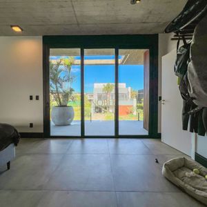 Casa de Condomínio com 350m², 3 dormitórios, 3 suítes, 2 vagas no Condomínio Ilhas Park em Torres para Comprar