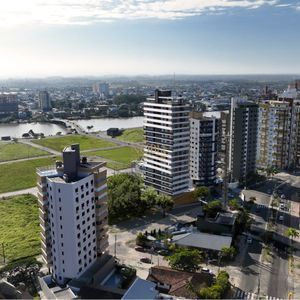 Apartamento com 73m², 2 dormitórios, 1 suíte, 1 vaga no Residencial New em Torres para Comprar