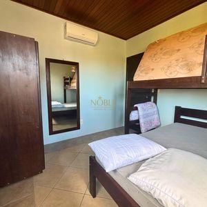 Casa, 3 dormitórios, 1 suíte, 2 vagas no bairro Itapeva Norte em Torres para Comprar