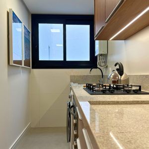 Apartamento com 71m², 2 dormitórios, 1 suíte, 2 vagas no Residencial DI Capri em Torres para Comprar