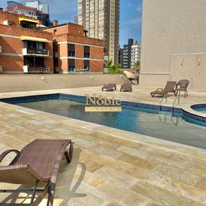 Apartamento com 120m², 3 dormitórios, 1 suíte, 2 vagas no Michelângelo em Torres para Comprar