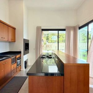 Casa de Condomínio com 207m², 3 dormitórios, 3 suítes, 2 vagas no Reserva das Águas em Torres para Comprar