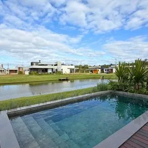 Casa de Condomínio com 277m², 3 dormitórios, 3 suítes, 2 vagas no Reserva das Águas em Torres para Comprar