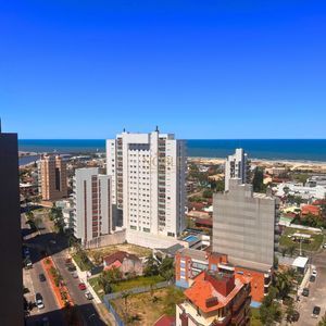 Apartamento com 88m², 3 dormitórios, 3 suítes, 2 vagas no Perito Moreno em Torres para Comprar