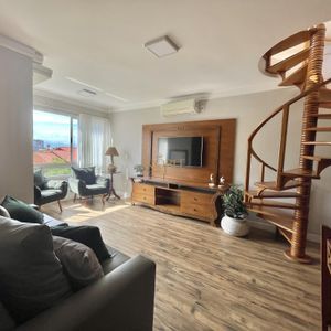 Cobertura com 130m², 2 dormitórios, 1 suíte, 2 vagas no Riviere em Torres para Comprar