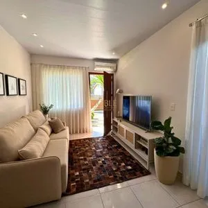 Casa com 108m², 2 dormitórios, 2 vagas no bairro Capão do Cravo em Passo de Torres para Comprar