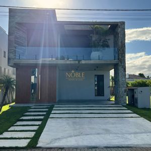 Casa de Condomínio com 350m², 3 dormitórios, 3 suítes, 2 vagas no Condomínio Ilhas Park em Torres para Comprar