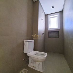 Apartamento com 114m², 3 dormitórios, 1 suíte, 2 vagas no Titanium em Torres para Comprar