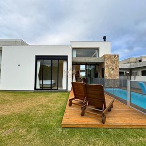 Casa de Condomínio com 201m², 3 dormitórios, 3 suítes, 3 vagas no Reserva das Águas em Torres para Comprar