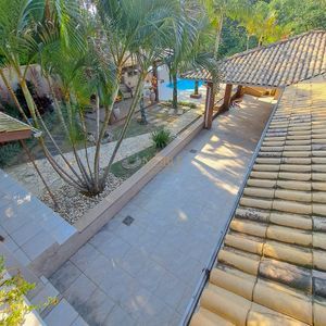 Sobrado com 330m², 3 dormitórios, 1 suíte, 5 vagas no bairro Centenário em Torres para Comprar