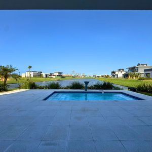 Casa de Condomínio com 311m², 3 dormitórios, 3 suítes, 2 vagas no Reserva das Águas em Torres para Comprar