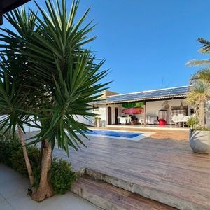 Casa, 3 dormitórios, 1 suíte, 2 vagas no bairro Praia Grande em Torres para Comprar