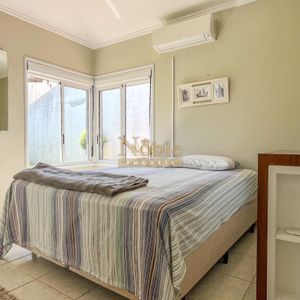 Casa, 2 dormitórios, 2 vagas no bairro Igra Norte em Torres para Comprar