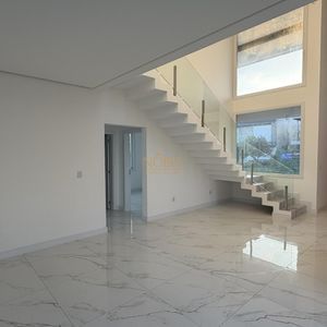 Casa com 474m², 4 dormitórios, 4 suítes, 2 vagas no Condomínio Ilhas Park em Torres para Comprar