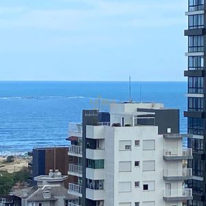 Apartamento com 88m², 3 dormitórios, 3 suítes, 2 vagas no Perito Moreno em Torres para Comprar