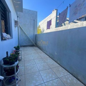 Casa, 3 dormitórios, 1 suíte, 2 vagas no bairro Igra Sul em Torres para Comprar