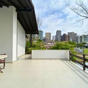 Casa com 518m², 5 dormitórios, 2 suítes, 2 vagas no bairro Praia Grande em Torres para Comprar