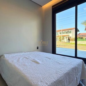 Casa com 180m², 3 dormitórios, 1 suíte, 2 vagas no bairro Praia da Cal em Torres para Comprar